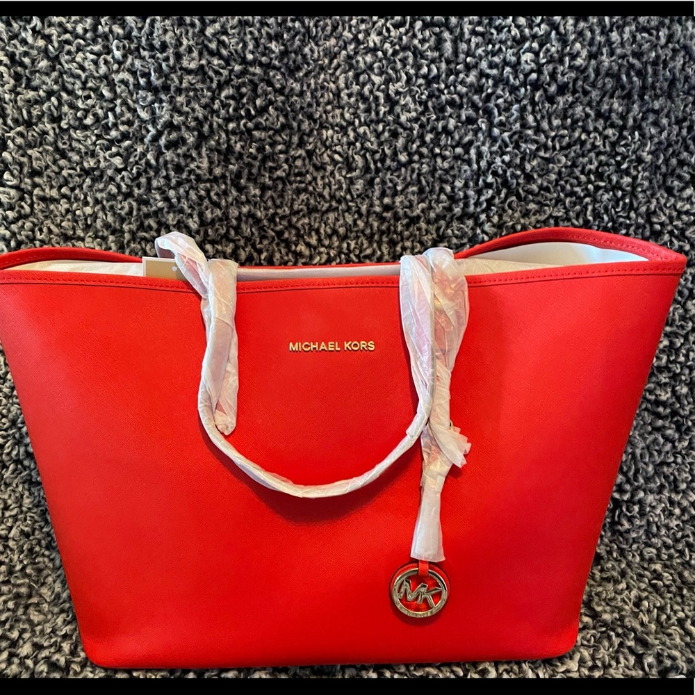 Authentic Michael Kors mandarin jetsetter steffiano leather tote.